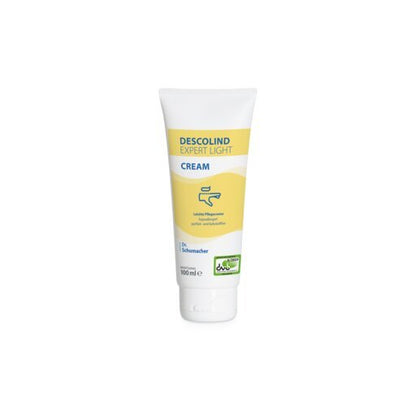 100 ml:n Dr. Schumacher DESCOLIND EXPERT LIGHT CREAM -käsivoidetuubi, jossa on valkoinen korkki ja kelta-sininen etiketti, seisoo pystyssä valkoisella taustalla - ihanteellinen herkälle iholle ja hypoallergeeninen.