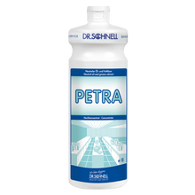 Eine weiße 1-Liter-Kunststoffflasche mit der Aufschrift "Dr. Schnell PETRA Öl- und Fettlöser für Oberflächen" der DR.SCHNELL GmbH & Co. KGaA, mit blauer Schrift und Grafik, enthält einen hochkonzentrierten Oberflächenreiniger und Öl-/Fettlöser für die kraftvolle Reinigung.