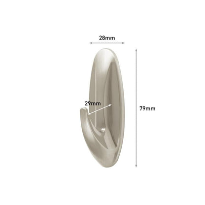 Command™ Medium Designer Hook metallisessa ulkonäössä 3M Deutschland GmbH:ltä (17081BN) on kuvattu. Mitat: 28 mm leveys, 29 mm syvyys, 79 mm korkeus - merkitty nuolilla ja tekstillä.