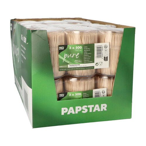 Pahvilaatikko, jossa on merkintä "PAPSTAR GmbH", sisältää useita pakattuja paketteja PAPSTAR hammastikkuja puusta "pure", pyöreä, 6,7 cm annostelijassa (1500 kappaletta), joissa korkealaatuiset puuhammastikut esitellään huolellisesti.