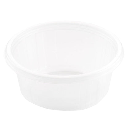 Fixpack® pyöreä läpinäkyvä PP-säiliö Duni GmbH:lta on kirkas, pyöreä tyhjä säiliö, jossa on hieman kohotettu reuna, esitettynä viistosti valkoista taustaa vasten.
