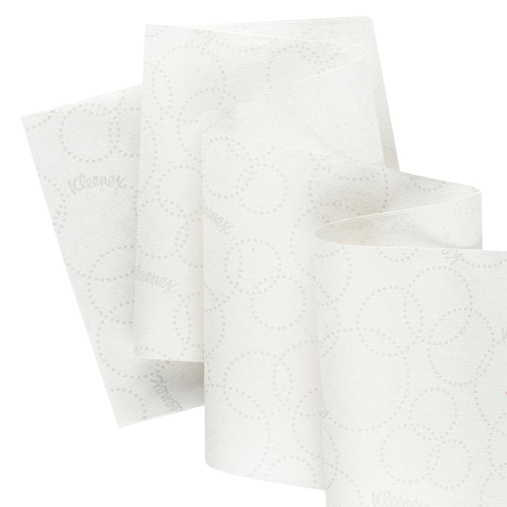 Lähikuva valkoisista, 1-kerroksisista Kleenex® Rollenhandtücher - E-roll Slimroll™ Kimberly-Clark GmbH:lta (6x135m), joissa on hienovarainen, pyöreä kuvio ja jotka ovat ihanteellisia Slimroll-annostelijoihin.