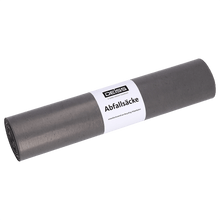 Rulla harmaita DEISS 24054 roskapusseja (700x1100 mm, 25 kappaletta) EMIL DEISS KG (GmbH + Co.) valkoisella etiketillä seisoo yksinkertaisella, vaalealla taustalla.