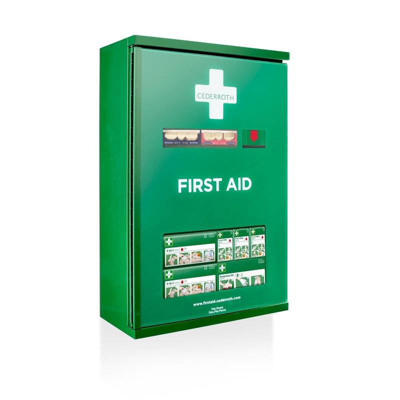Vihreä seinälle asennettu Cederroth-ensiapukaappi kaksiosaisella ovella (metalli) Orkla Wound Care AB:ltä (L 385 x K 575 x S 170 mm) valkoisella ristillä, näkyvillä tarvikekoteloilla ja kuvitetulla käyttöohjeella helppoa pääsyä varten.