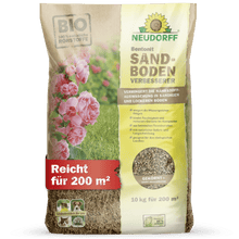 10 kg:n säkki Neudorff Shop Bentonit SandbodenVerbesserer riittää 200 m²:lle, on ihanteellinen hiekkamaille ja sen pakkauksessa on vaaleanpunaisia kukkia ja lähikuva mineraalipitoisesta sisällöstä.