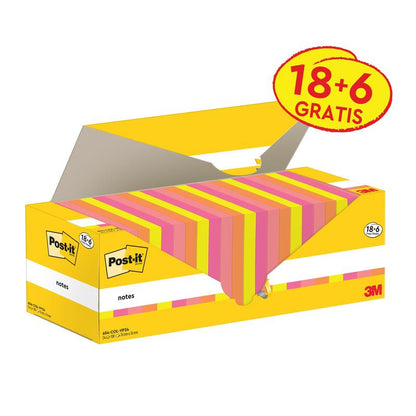 Avattu kelta-valkoinen 3M Post-it® -muistiinpanolaatikko (76 x 76 mm, 100 arkkia/lohko, 100% PEFC) punakeltaisella "18+6 ILMAISEKSI" -etiketillä paljastaa pinon vaaleanpunaisia, keltaisia ja oranssiraidallisia muistilappuja. Merkki: 3M Deutschland GmbH.
