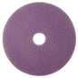 Das Diversey Twister Pad lila, rund, ideal für die Unterhaltsreinigung beschichteter Hartböden, wird von oben auf weißem Hintergrund gezeigt und besitzt eine mittige Öffnung.