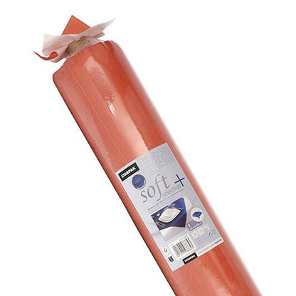 Rulla Starpak-pöytäliinaa, kankaan kaltainen kuitukangas "soft selection plus" lääketieteellinen paperi keskitetty etiketti Starpak-brändillä, käyttöohjeilla ja kuvalla tutkimuspöydästä, joka on peitetty paperilla ja korostaa pitkäikäisen pöytäliinan laatua.