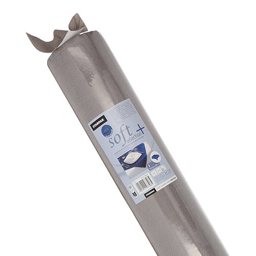 Rulla harmaata, liukumatonta Starpak-pöytäliinaa, kankaan kaltainen kuitukangas "soft selection plus" osittain rullattuna, Starpak-brändin tuoteetiketillä ja sarjan nimellä "soft selection plus".