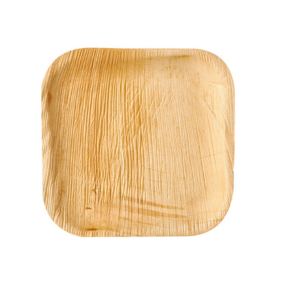 Der PAPSTAR 6 lautanen "pure" nelikulmainen palmunlehdestä PAPSTAR GmbH:lta on ympäristöystävällinen kertakäyttölautanen näkyvillä syillä ja pyöristetyillä kulmilla, esiteltynä valkoisella taustalla.