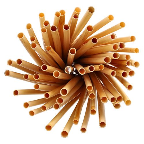 Ylhäältä katsottuna PAPSTAR ruokopillit "pure" (Ø 7 mm, 20 cm), niputettu ympyrään avoimilla päillä - ympäristöystävällinen vaihtoehto perinteisille pilleille PAPSTAR GmbH:lta, taittopakkaus 100 kappaletta.