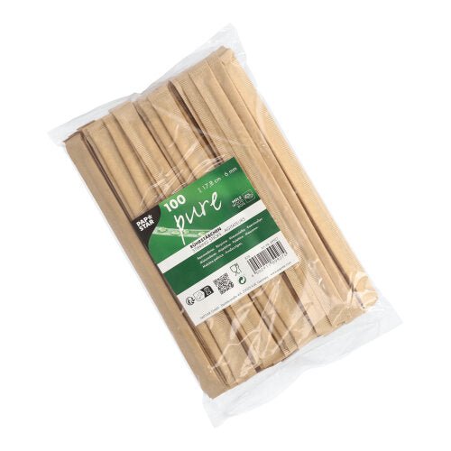 Läpinäkyvässä muovipussissa on 100 PAPSTAR sekoitustikkua puuta "pure" 17,8 cm, yksittäin folioon pakattuna, jokaisessa vihreä-valkoinen PAPSTAR GmbH-etiketti etupuolella.