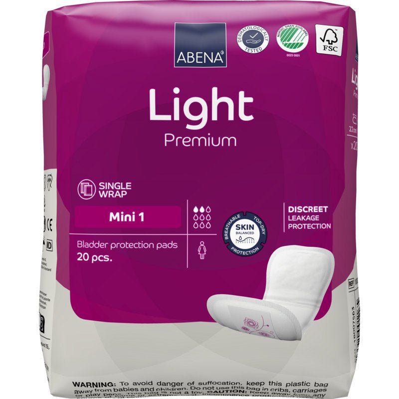 Yksi pakkaus ABENA Light Mini 1, Premium Abena Re-Seller GmbH:ltä sisältää 20 tyynyä lievään inkontinenssiin. Violetti pakkaus sisältää yksittäispakkauksen ja huomaamattoman vuotosuojan selkeällä valkoisella tekstillä ja symboleilla.