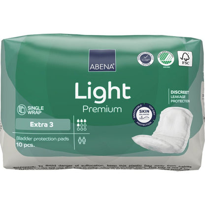 Vihreä-valkoinen pakkaus ABENA Light Extra 3, Premium Abena Re-Seller GmbH:ltä sisältää 10 kappaletta virtsankarkailusuojia. Pakkaus esittelee ominaisuudet ja kuvan suojasta oikealla puolella päivittäiseen mukavuuteen.