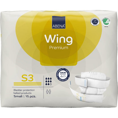 Abena Re-Seller GmbH:n ABENA Wing Premium -vyövaippapaketti, koko S3, 15 kappaletta. Valkoinen pakkaus, jossa on keltaisia aksentteja, korostaa suoja- ja mukavuusominaisuuksia ja näyttää kuvan vaipasta.