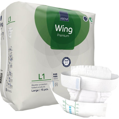 Kuvassa on pakkaus ABENA Wing Premium Abena Re-Seller GmbH:ltä (Large, 15 kappaletta). Yksi vaippa on kuvattu edessä korostaen sen muotoilua suojan ja mukavuuden takaamiseksi.