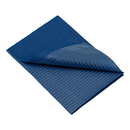 Taiteltu sininen pressu, jossa on näkyvä sisäkerros ja kuvioitu pinta, muistuttaa AMPri Handelsgesellschaft mbH:n Dental kertakäyttöisten potilasliinojen kestäviä materiaaleja ja sen koko on 33 x 45 cm.