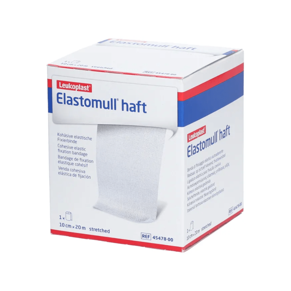 Laatikko BSN Elastomull® haft, BSN Medical GmbH:n joustava kiinnitysside. Laatikko on pääosin valkoinen sinisillä ja punaisilla yksityiskohdilla ja esittelee etupuolella tuotetiedot ja eritelmät.