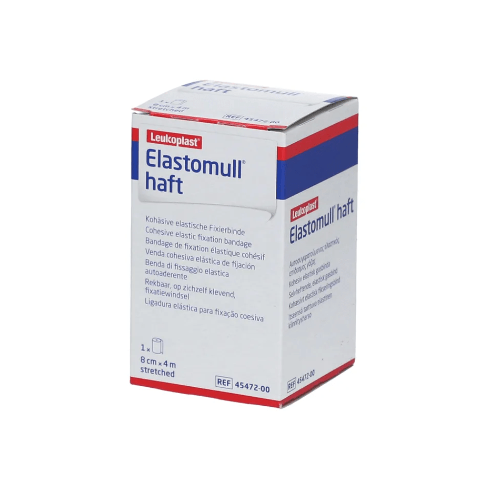 Näyttelyssä on laatikko BSN Elastomull® haft, BSN Medical GmbH:n lateksiton polymeerinen joustava kiinnitysside. Pääosin valkoinen pakkaus on varustettu punaisilla ja sinisillä yksityiskohdilla ja sisältää tekstiä useilla kielillä.