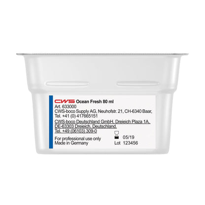 Valkoinen 80 ml:n astia, jossa on teksti "CWS ParadiseLine pesuhuonetuoksu annostelijalle Paradise Air Bar" CWS:ltä, valmistettu Saksassa ammattikäyttöön, ohjeet ja yhteystiedot; viimeinen käyttöpäivä 05/19, eränumero 123456.