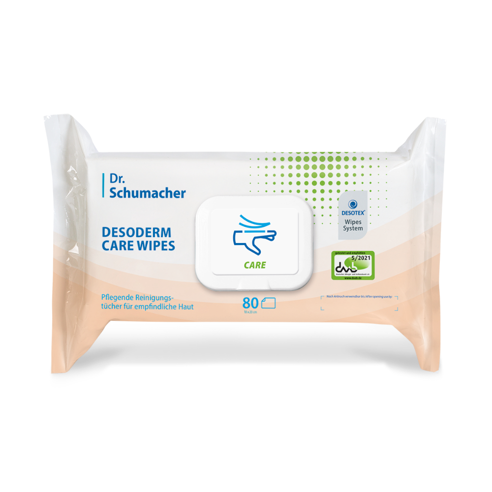 Kuvassa on pakkaus Dr. Schumacher Desoderm Care Wipes kosteita pyyhkeitä Dr. Schumacher GmbH:lta. Valkoinen pakkaus sisältää 80 hoitavaa kosteuspyyhettä ja siinä on vihreä hoitosymboli, tuotemerkki ja sinivihreä värimaailma. Pakkauksessa on uudelleensuljettava kansi.