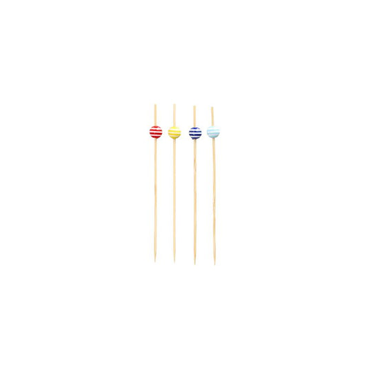 Neljä 12 cm kokoista PAPSTAR sormiruokatikua, jotka on koristeltu punaisilla, keltaisilla, sinisillä ja vaaleansinisillä helmillä, on asetettu riviin. PAPSTAR GmbH:n tyylikkäät tuotteet on valmistettu kestävistä kertakäyttötuotteista ja ne lepäävät elegantisti yksinkertaisella valkoisella pinnalla.