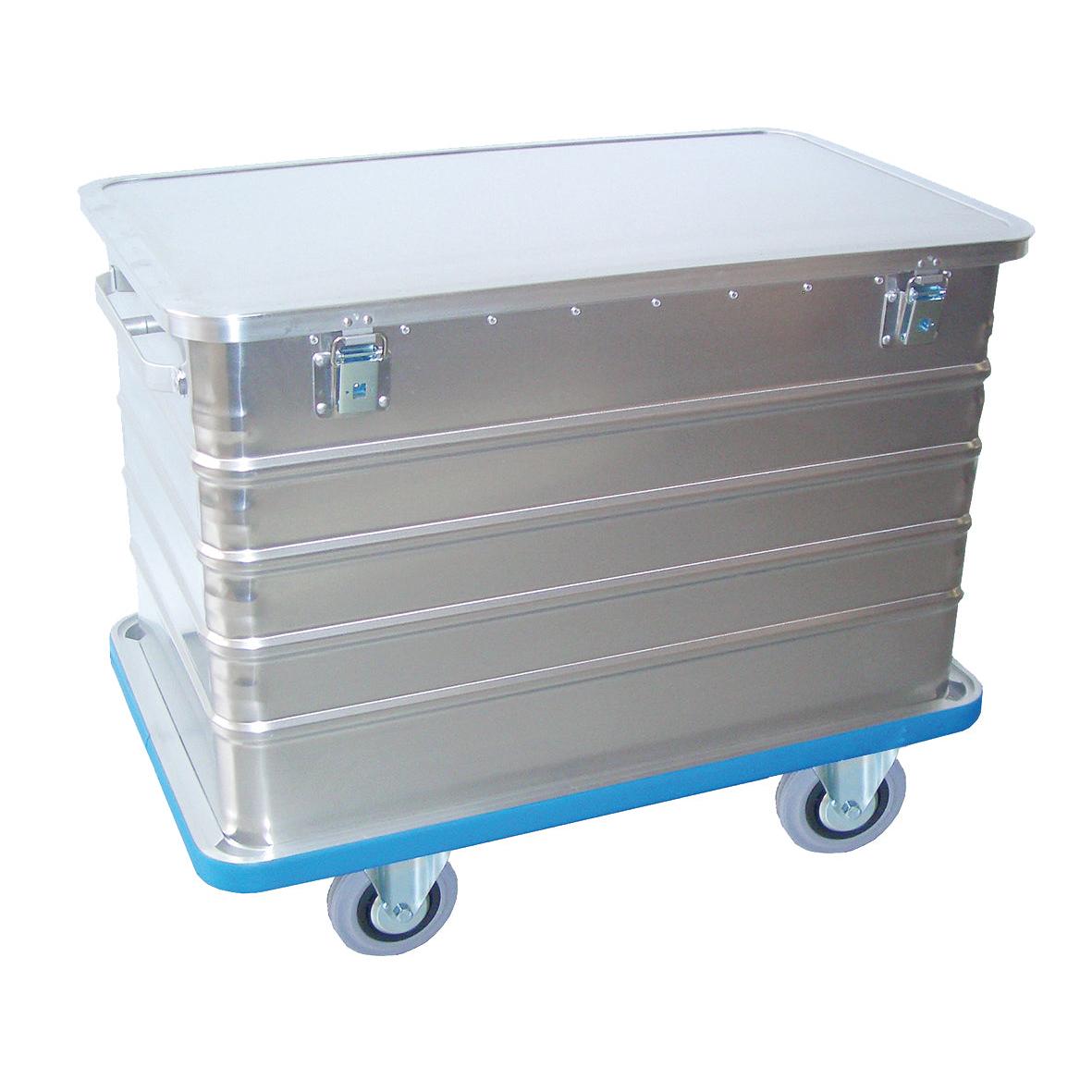 Novocal-kuljetuskontti alumiinista, saranoidulla kannella, ympäriinsä kulkevalla törmäyssuojalla ja kahdella lukolla, asennettuna siniselle rullapohjalle helppoa liikkuvuutta varten.