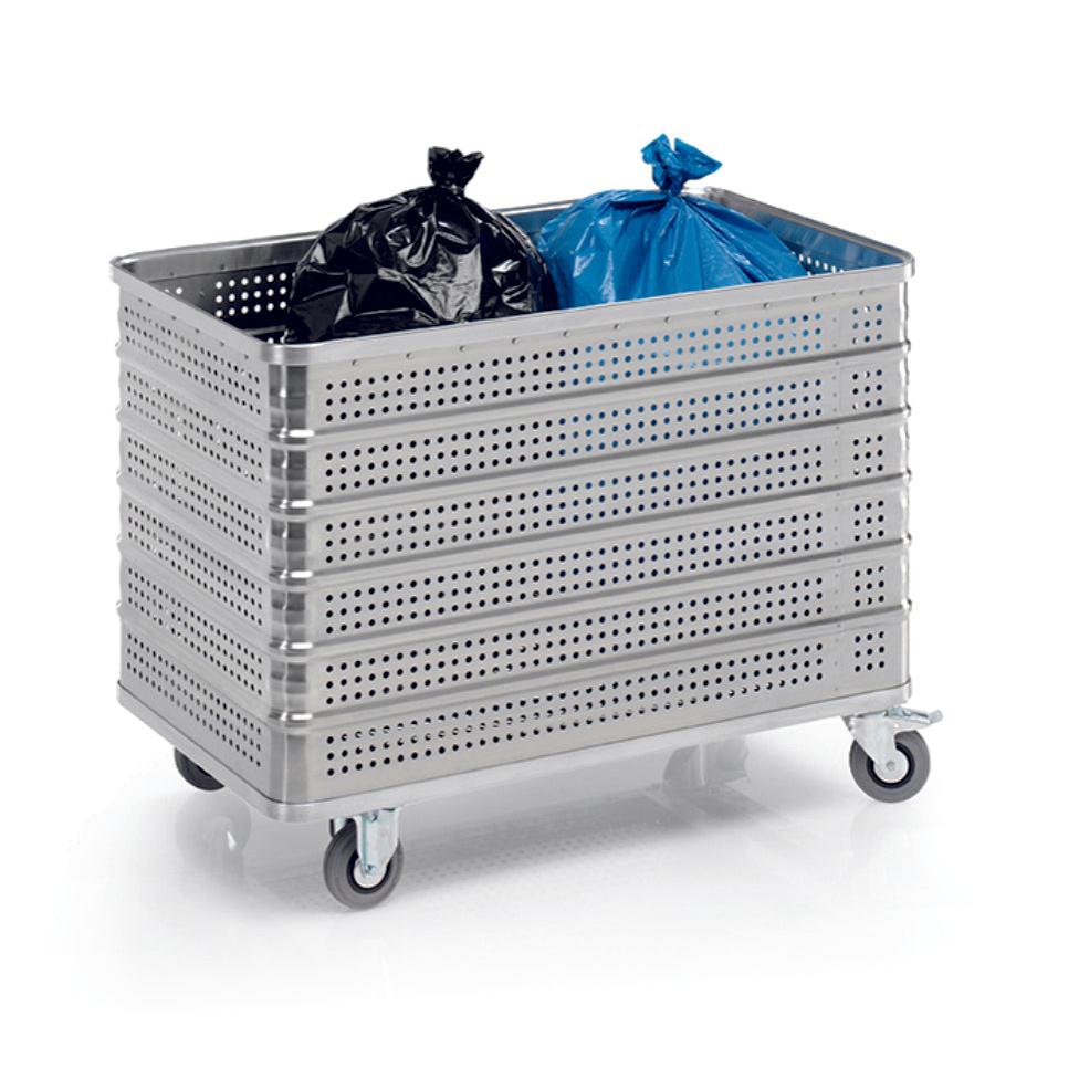 Novocalin alumiininen kuljetussäiliö, jonka tilavuus on 430 L, varustettu kahdella kiinteällä ja kahdella kääntyvällä pyörällä (Ø125), sisältää mustan ja sinisen roskapussin. Teollisuusvaunu on valokuvattu valkoista taustaa vasten.