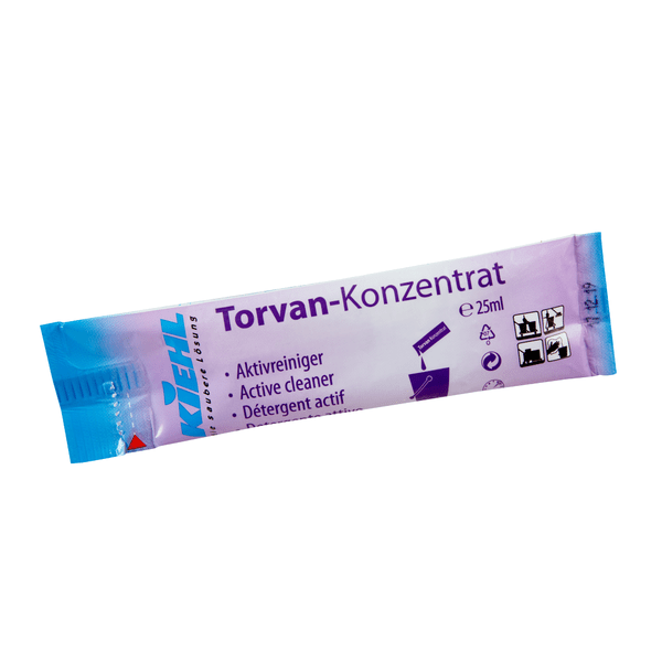 Kertakäyttöpussi Kiehl Torvan-konzentrat Aktivreiniger, 25 ml, Johannes Kiehl KG on varustettu violetti-sinisellä pakkauksella, jossa on saksalaisia, englantilaisia ja ranskalaisia symboleita/tekstejä, jotka viittaavat aktiivipuhdistajan toimintaan.