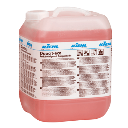 Suuri, läpinäkyvä muovisäiliö, jossa on vaaleanpunaista nestettä, on merkitty tekstillä "Kiehl Duocit-eco Saniteettipuhdistusaine appelsiinituoreudella" Johannes Kiehl KG:lta ja sen etupuolella on tuotetietoja ja ympäristöystävällisiä puhdistusvinkkejä saksaksi.