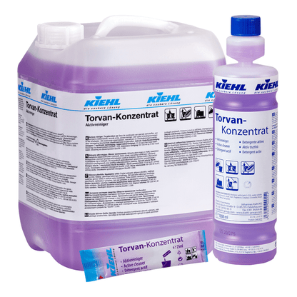 Johannes Kiehl KG:n Kiehl Torvan-konzentrat Aktivreiniger -sarja koostuu 5 litran säiliöstä, 1 litran pullosta ja pussista, joissa on violettia nestettä ja valkoinen pakkaus saksalaisella etiketillä.