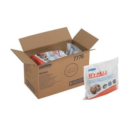 Avoin laatikko, jossa lukee "WypAll" Kimberly-Clark GmbH:lta, sisältää useita suljettuja WypAll®-pyyhepaketteja - Vihreä (6 pussia x 75 arkkia). Yhden pakkauksen ulkopuolella on brändäys ja kuvia käsistä, jotka käyttävät vihreitä puhdistuspyyhkeitä.