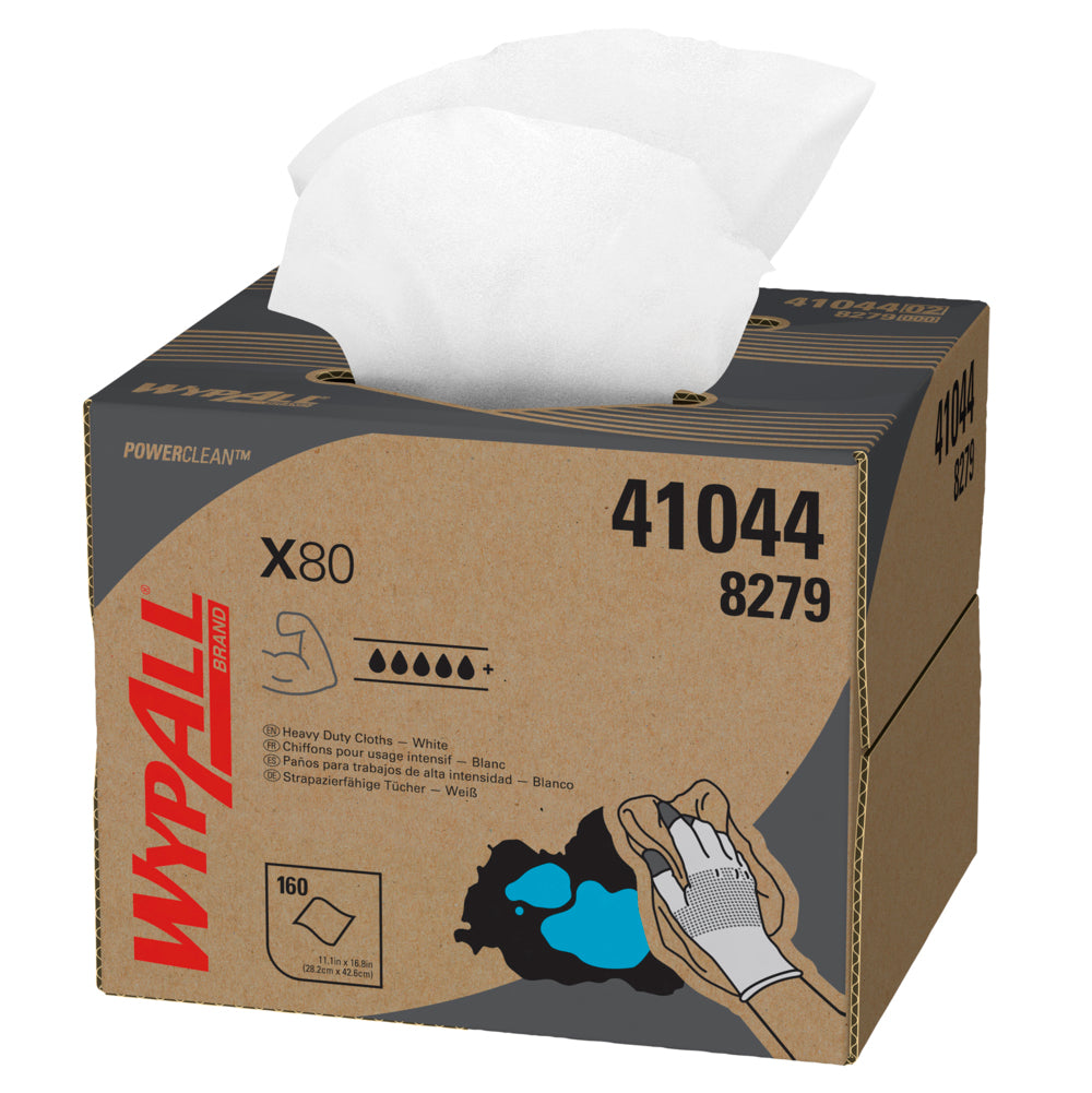 Eine braune Pappschachtel mit der Aufschrift "WypAll® X80 PowerClean - BRAG™ Box / Weiß - 1 Brag Box x 160 Blatt | Karton (1 Box)" der Kimberly-Clark GmbH, mit einem weißen Wischtuch an der Oberseite und Produktabbildungen für die industrielle Reinigung.