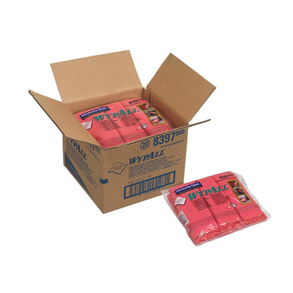 Avoin Kimberly-Clark GmbH:n laatikko, jossa on merkintä "WypAll", sisältää useita pakkauksia WypAll® mikrokuituliinoja - litteä liina, 40 x 40 cm. Jokainen pakkaus sisältää punaisia mikrokuituliinoja; yksi litteä liina on laatikon ulkopuolella.
