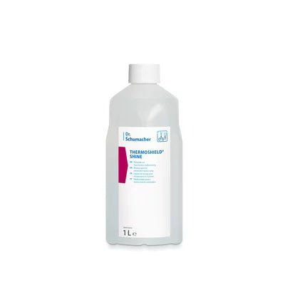 Läpinäkyvä 1 litran muovipullo Dr. Schumacher GmbH:lta, jossa on valkoinen korkki ja merkintä "Dr. Schumacher THERMOSHIELD SHINE | Pullo (1 l)", seisoo pystyssä valkoista taustaa vasten.