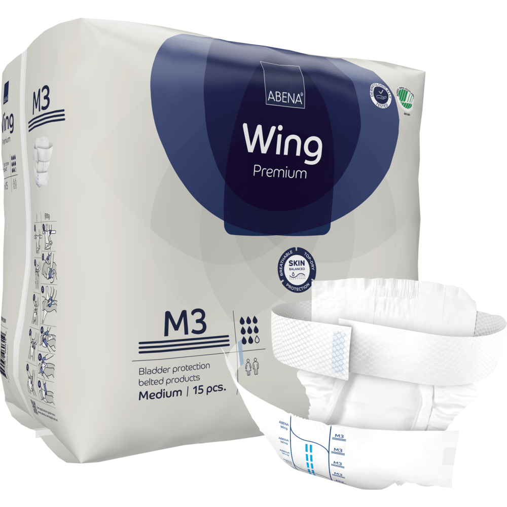 Abena Re-Seller GmbH:n ABENA Wing Premium aikuisten vaippapakkaus, koko M3, sisältää 15 kappaletta. Edessä on kuva vaipasta, joka korostaa sen muotoilua ja läppiä optimaalisen suojan ja mukavuuden takaamiseksi. Pakkaus näyttää tuote- ja tuotemerkkitiedot.