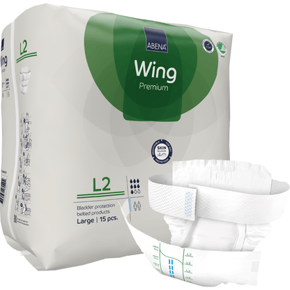 15-osainen pakkaus ABENA Wing Premium aikuisvaippoja (koko L2) Abena Re-Seller GmbH:ltä tulee valko-vihreässä pakkauksessa, joka korostaa suojaa ja mukavuutta, ja yksi vaippa on kuvattu ulkopuolella esittäen sen muotoilua.