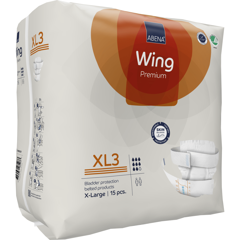 Pakkaus Abena Re-Seller GmbH:n ABENA Wing Premium XL3 -inkontinenssituotteita (X-Large, 15 kappaletta) tarjoaa suojaa ja mukavuutta pääosin valkoisessa pakkauksessa, jossa on oransseja korostuksia ja selkeitä tuotetietoja.