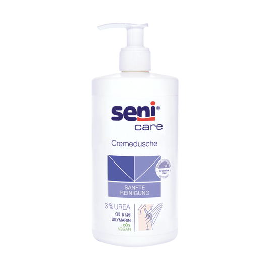 Se Seni TZMO Deutschland GmbH:n Care-suihkuvoide, 500 ml, sisältää 3 % ureaa, silymariinia ja on valmistettu vegaanisella koostumuksella. Valkoisessa pullossa on pumppusäiliö, ja siinä on sininen teksti ”SANFTE REINIGUNG” (hellävarainen puhdistus), mikä tekee siitä ihanteellisen kuivalle iholle.