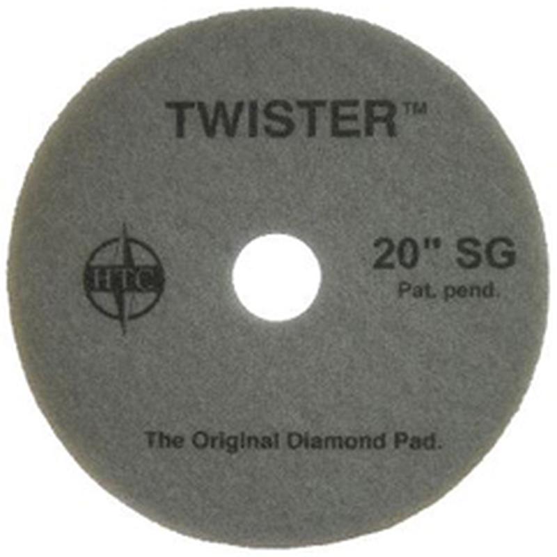 Twister Pad 10000 Diversey Deutschland GmbH & Co. OHG:lta on pyöreä, harmaa lattiatyyny, jossa on keskellä reikä ja merkintä "TWISTER 20'' SG - The Original Diamond Pad". Ihanteellinen kovien lattioiden puhdistukseen ja kiillotukseen.