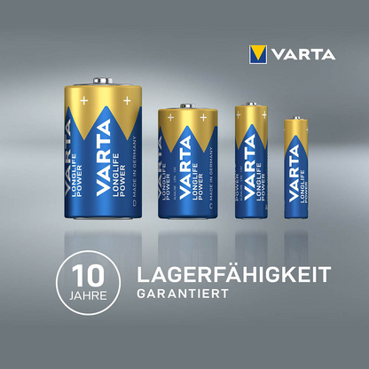 Harmaalla taustalla on neljä erikokoista Varta AG Longlife Power 9V E-Block 4922 MN1604 paristoa, ja niiden alla on grafiikka, jossa lukee '10 vuoden säilyvyystakuu'.