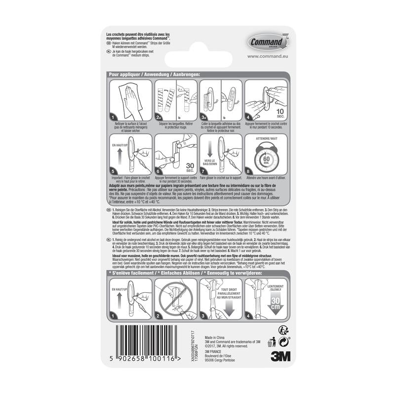 Command™ Medium Drahthakenin, 17068 3M Deutschland GmbH:ltä, takaosa näyttää ohjeet vahingoittamattomaan ripustamiseen liimateknologian avulla, vaiheittaiset kuvat, monikielisen tekstin ja viivakoodin alareunassa.