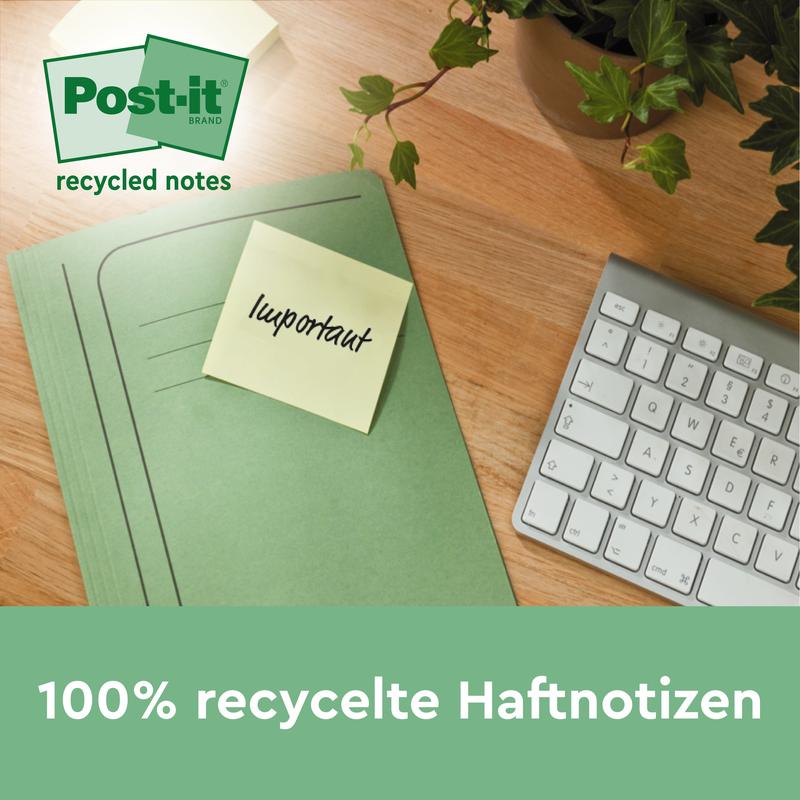 Vihreä kansio, jossa on 3M Deutschland GmbH:n Post-it® kierrätetty Z-lappu, jossa lukee "tärkeää", on puupöydällä näppäimistön ja kasvin vieressä. Alla oleva teksti kuuluu: "100% kierrätetyt muistilaput, 76x76mm, 100 arkkia/lohkare, 100% PEFC.